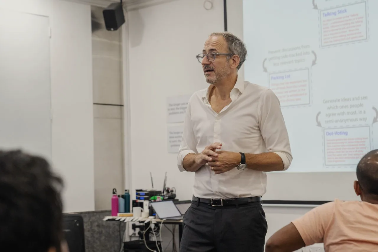 Pete Deemer teaching in front of a whiteboard during ScrumMaster training